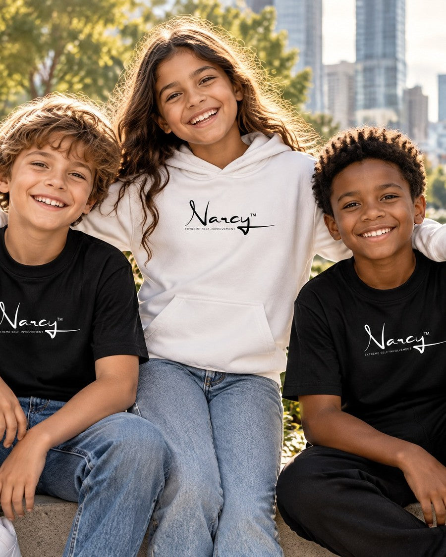 Three children wearing Narcy logo hoodies and tees in a city park