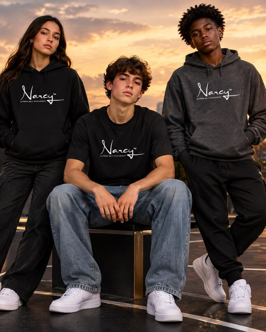 Three teens wearing Narcy hoodies and a tee on an urban basketball court